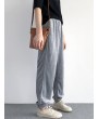 Loose Pockets Solid Color Elastic Waist Harem Pants